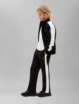 Tuta nera in misto cotone con bande bianche - Calvin Klein - FashionsVida