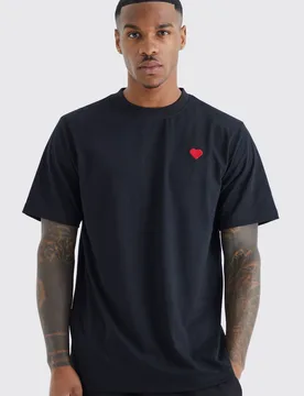 Herren T-Shirt mit Herz-Stickerei Black Größe XS - boohooMAN - FashionsVida