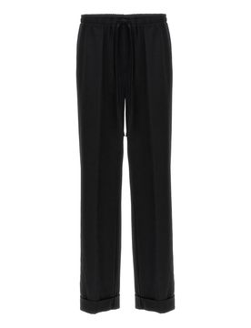Pantaloni con piping a contrasto