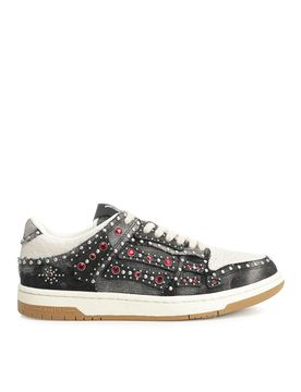Amiri Sneaker Skel con borchie