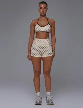 Top deportivo de cuello halter con espalda abierta y con tiras, de toque suave, con estampado de lunares, solo top coord para actividades deportivas, - Shein - FashionsVida