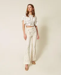 Pantalon évasé en dentelle avec ceinture