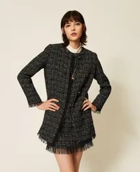 Manteau en bouclé et tulle plumetis