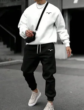 Piezas Conjunto de sudadera y pantalón de chándal para hombre de otoño, sudadera de cuello redondo de manga larga blanca, pantalón jogger negro de - Shein - FashionsVida