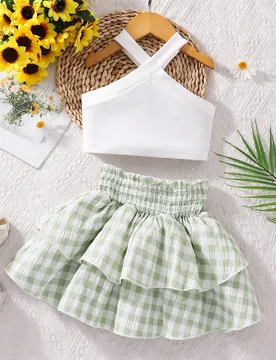 Conjunto de top de tirantes de color liso y falda con volantes florales y cintura elástica para niña joven, estilo casual de vacaciones de verano - Shein - FashionsVida