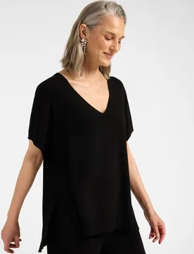 Jersey de mujer de viscosa con escote en v ajuste oversize y longitud media - Elena Miró - FashionsVida