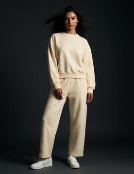 Pantaloni da tuta barrel - giallo chiaro