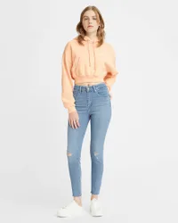 Jeans 721 skinny a vita alta con rotture sulle ginocchia in lyocell e cotone blu super stone washed