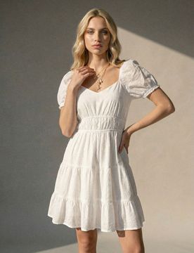 Abito mini in cotone con effetto a balze e motivo traforato - bianco