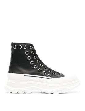 Sneakers in pelle con occhielli