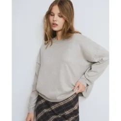 Jersey de mujer con tachas