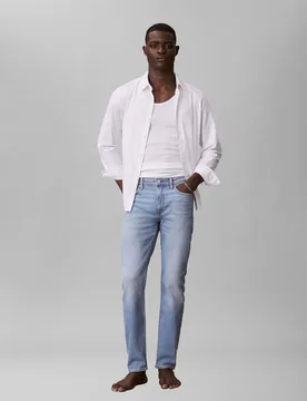 Jeans slim tapered light wash in cotone elasticizzato - Calvin Klein - FashionsVida