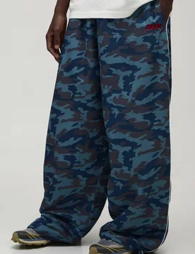 Herren Extreme Fallschirm Tarn Trainingshose Blue Größe XL - boohooMAN - FashionsVida