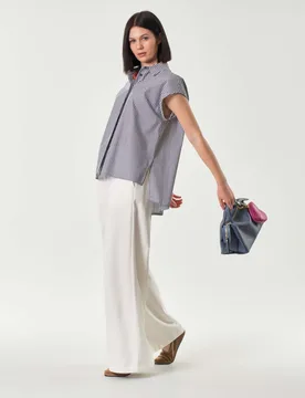Pantaloni palazzo bianchi in denim di cotone con elastico inserito in vita sul retro - Hlo! - FashionsVida