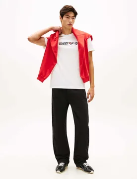 T-shirt girocollo bianca in cotone con logo grafico stampato - Tommy Jeans - FashionsVida
