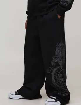 Men's Extreme Wide Leg Dragon Graphic Joggers Black Size Medium Black M - boohooMAN - FashionsVida