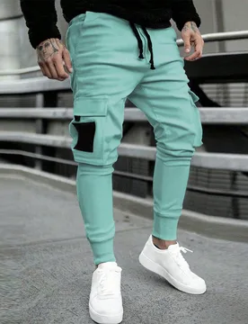Pantalones cargo de hombre con ajuste holgado, bolsillos con solapa y cintura con cordón, para otoño - Shein - FashionsVida