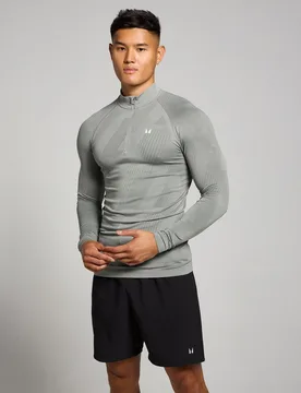 Camiseta de entrenamiento con cremallera de 1/4 sin costuras con estampado gráfico de pilares Tempo para hombre de MP - Tormenta - XL - MyProtein - FashionsVida