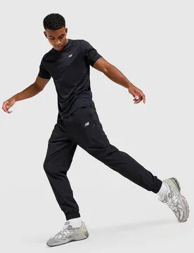 Woven Trainingshose - Herren, Schwarz - male - Size: M - New Balance - FashionsVida