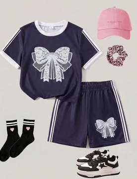 Conjunto de camiseta corta y pantalones cortos casuales de primavera y verano para niña joven, con estampado de lazo de encaje de color contrastante, - Shein - FashionsVida