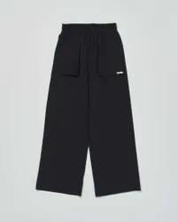 Pantalone palazzo nero in tessuto tecnico elasticizzato
