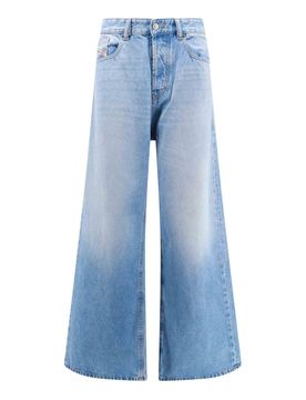 Jeans in cotone con patch logo posteriore
