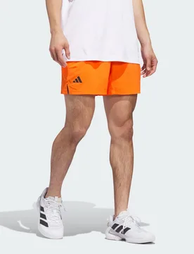 PANTALONCINI DA TENNIS ERGO 5 INCH S 13 CM Pure Orange - Adidas - FashionsVida