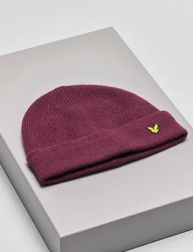 Berretto bordeuax in lana con risvolto e logo aquila gialla ricamata a lato - Lyle & Scott - FashionsVida