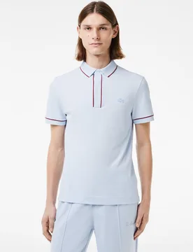 Polo de hombre de corte regular Paris de piqué elástico de manga corta - Lacoste - FashionsVida