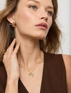 Collana con ciondolo a forma di fiocco - oro