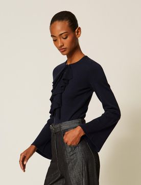 Pull ajusté avec volants