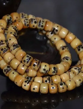 Tibetan-style camel bone carved A-dai bracelet with 108 beads, unisex cultural accessory - Aliexpress - FashionsVida