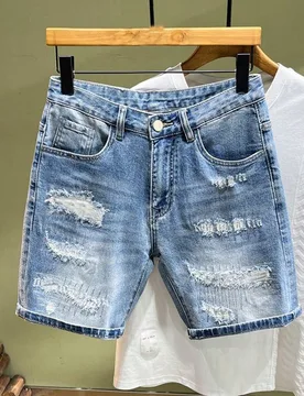 Pantalones cortos de mezclilla desgastados y rasgados para hombres, pantalones casuales sueltos y de pierna ancha, versátiles y a la altura de la rod - Shein - FashionsVida