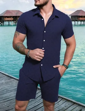 Piezas Conjunto de camisa de manga corta y pantalones cortos de unicolor con textura para vacaciones casuales para hombres, ropa de vacaciones para ho - Shein - FashionsVida
