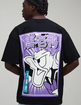 Herren Übergroßes Donald Duck Lizenz-Print Oberteil Black Größe Small - boohooMAN - FashionsVida