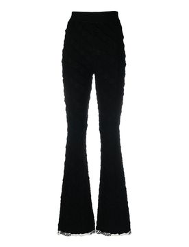 Pantaloni svasati in maglia a vita alta