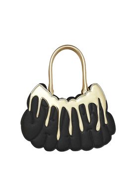 Borsa dorata e pericolosa con uno squalo