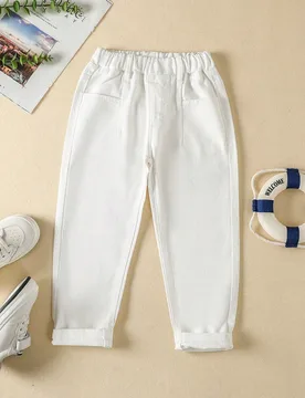 Jeans cargo holgados con bolsillos planos y cintura elástica para niño joven, estilo casual de calle y diseño neutral - Shein - FashionsVida