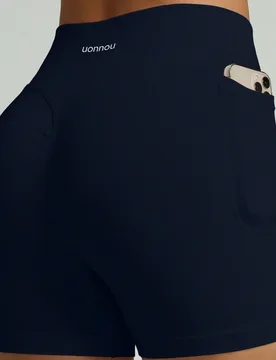Shorts de yoga de cintura alta para mujer, shorts de entrenamiento sin costuras con control de abdomen y levantamiento de glúteos con bolsillos - Shein - FashionsVida