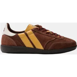 Zapatillas de piel de mujer asimétricas inspiradas en el balonmano