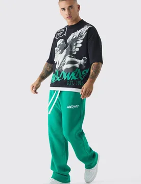 Herren Oversized Grafik Faux Layer T-Shirt und Jogger Hose Set Green Größe Medium - boohooMAN - FashionsVida