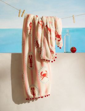 Coperta con motivo marino e pompon - corallo