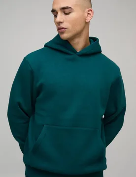 Herren Basic Regular Fit Kapuzenpullover Teal Größe Small - boohooMAN - FashionsVida