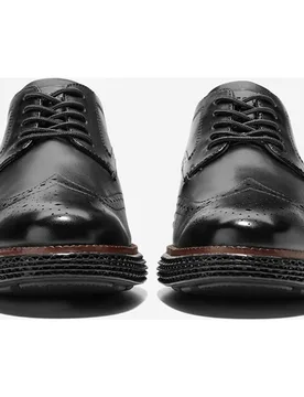 Zapatos de cordones de hombre en piel brogue y sistema de amortiguación Skyweave - Cole Haan - FashionsVida