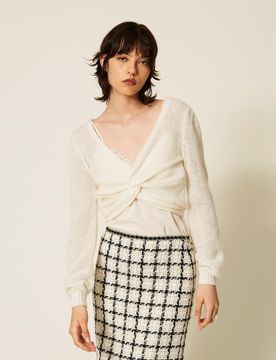 Pull-boléro double usage avec finition croisée