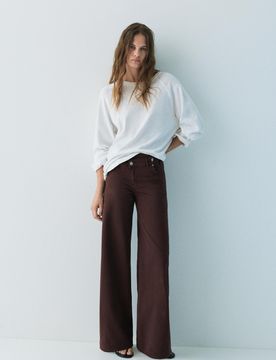 Jeans A Gamba Larga Con Cintura Incrociata