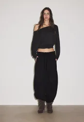 Asymmetrisches Shirt mit Wickeloptik Schwarz S