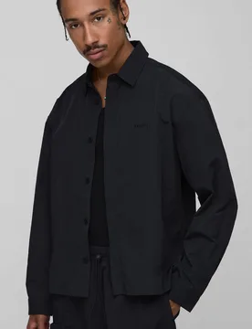 Herren Oversized Hemd mit verdeckter Knopfleiste und Crinkle-Struktur Black Größe Large - boohooMAN - FashionsVida