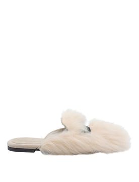 Pantofole in shearling e pelle scamosciata