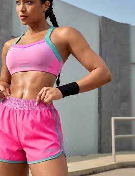 Conjunto deportivo de top halter y shorts con color de contraste y empalme para mujer - Shein - FashionsVida